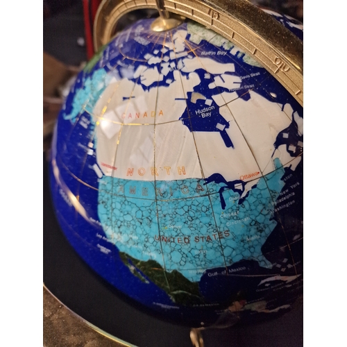 228 - A unique Blue Lapis stone ocean and Gemstone globe, with brass finish tri stand