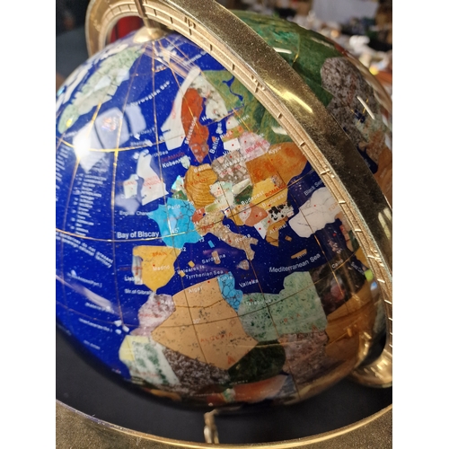 228 - A unique Blue Lapis stone ocean and Gemstone globe, with brass finish tri stand