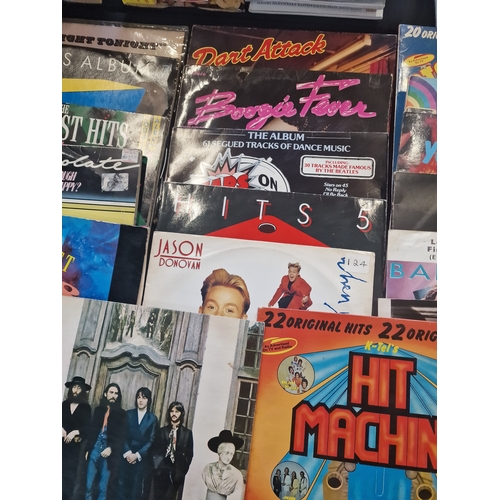 252 - A collection of mixed genre LPs including The Beatles, Greatest hit 1986 and 1987, Hits Album 7