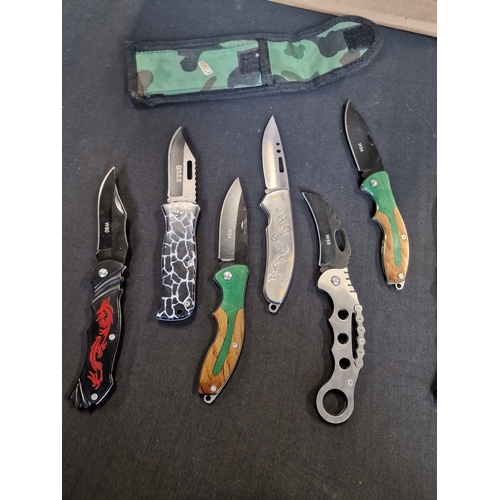 334 - Seven fishing flip knives various designs