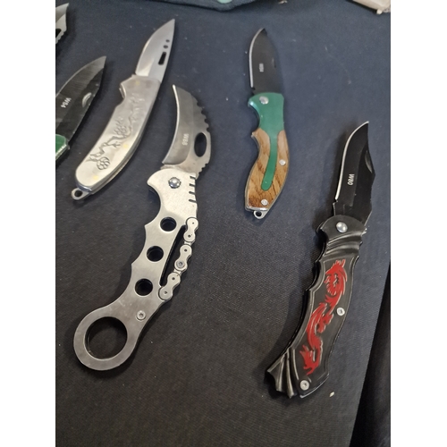 334 - Seven fishing flip knives various designs