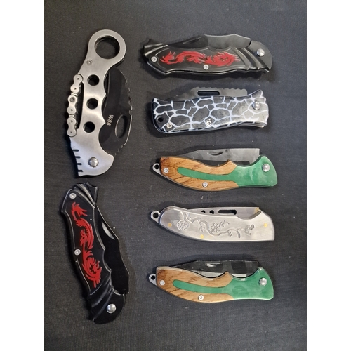 334 - Seven fishing flip knives various designs