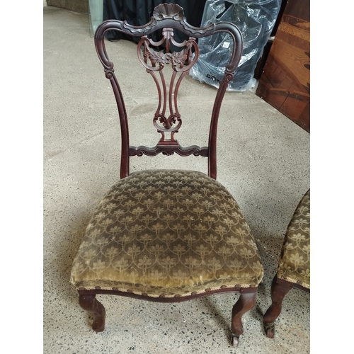 357 - Pair of Mahogany Ornate Carved Side Chairs on Castors