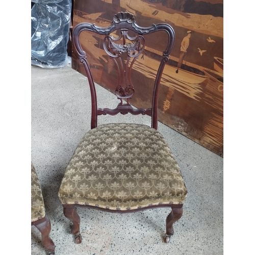 357 - Pair of Mahogany Ornate Carved Side Chairs on Castors