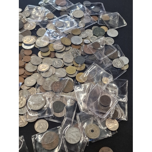 18 - A large collection of coins.  A mix british, foreign and various dates.