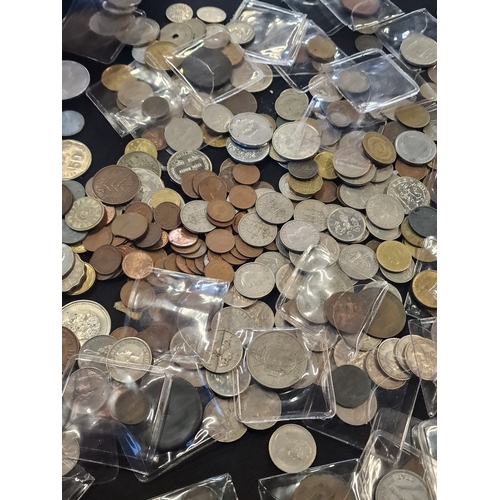 18 - A large collection of coins.  A mix british, foreign and various dates.