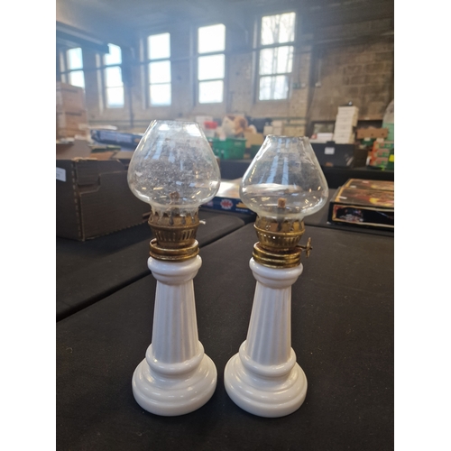 23 - A pair of vintage oil / paraffin lamps