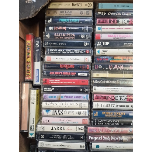 48 - A large collection of  cassette tapes including Paul Weller, Aero Smith, Anthrax, police and public ... 