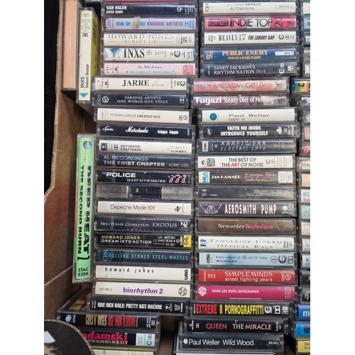 48 - A large collection of  cassette tapes including Paul Weller, Aero Smith, Anthrax, police and public ... 