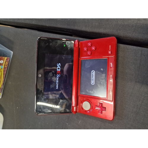 51 - Nintendo DS3 in Red with charger.  Tested for power