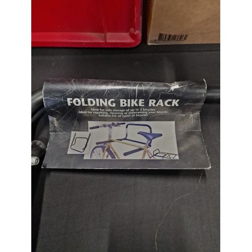 56 - Brand new folding Bike rack