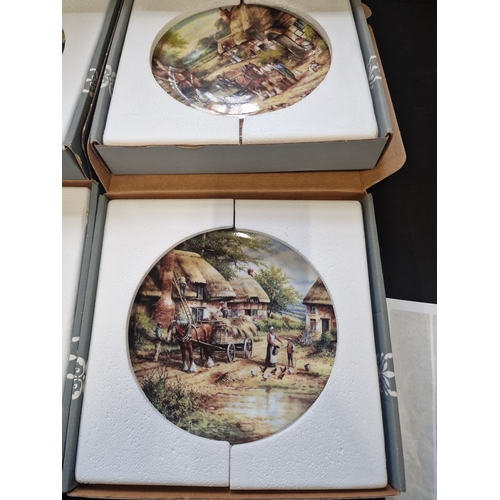 64 - A collection of 10 wedgewood collectable plates.  The Country Days Collection