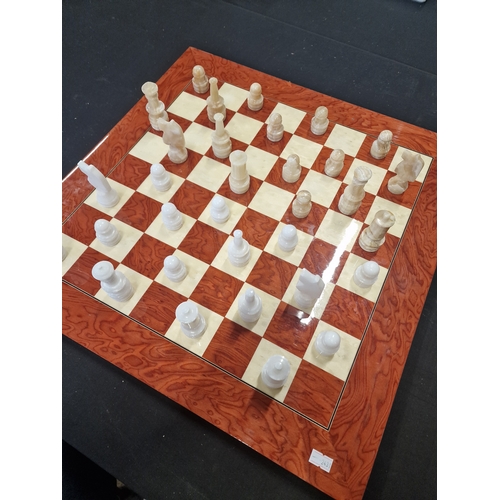 68 - Chess board with Onyx pieces