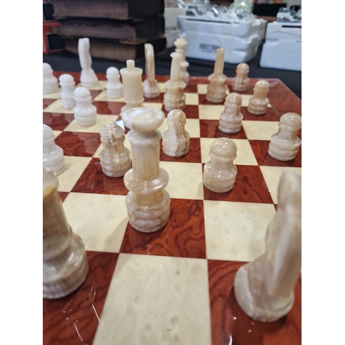 68 - Chess board with Onyx pieces