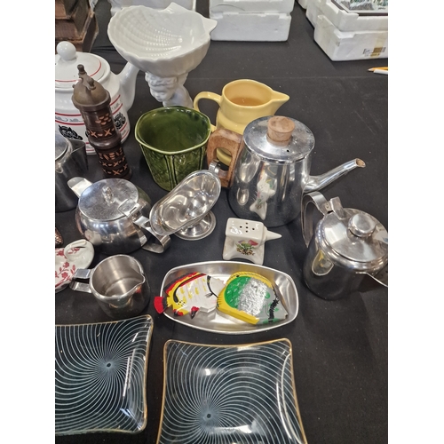 69 - A mix lot of stainless kitchen ware, pottery and chance glass