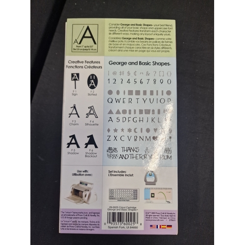 94 - Cricut font cartridges. George and basic shapes and speaking winter which is new and sealed