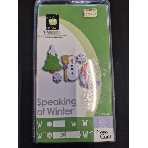 94 - Cricut font cartridges. George and basic shapes and speaking winter which is new and sealed