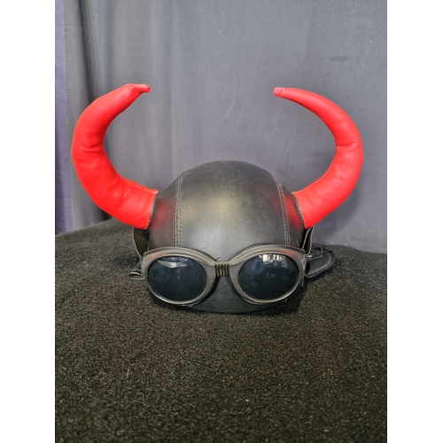 103 - Motor cycle or bike Red horn character helmet.