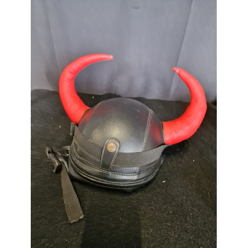 103 - Motor cycle or bike Red horn character helmet.