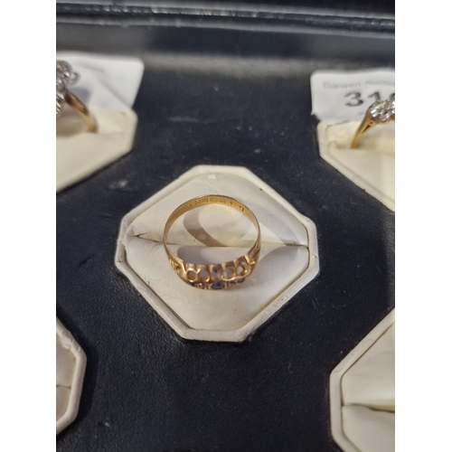 136 - 18ct gold Diamond and Sapphire ring. Size N weight approximately 1.67g