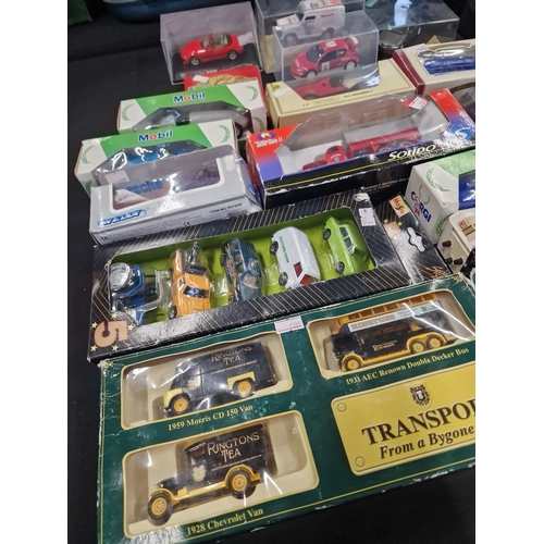 11 - A collection of vintage cars and vans including match box, Ringtons, Welly and Die-Cast