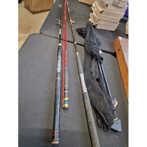 58 - Three fishing rods and a Leeda landing net