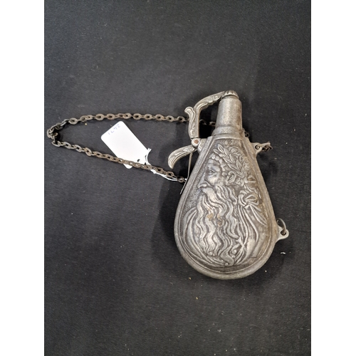 21 - Vintage Pewter powder bottle for a rifle. Lady to one side and Zues to the other. Complete with chai... 