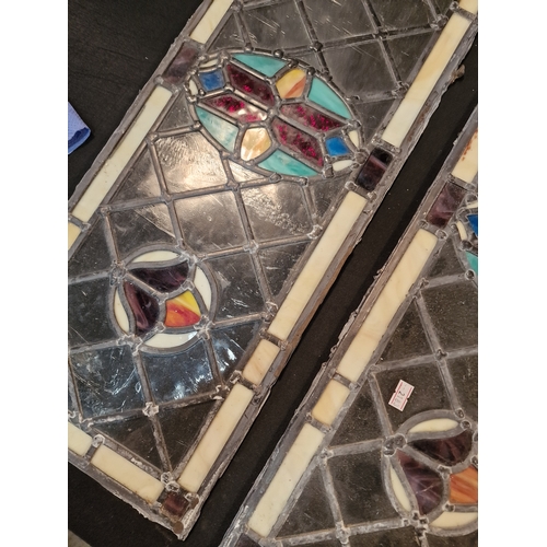 26 - Four pieces of Edwardian stained glass approximately 27cm W x 68cm L