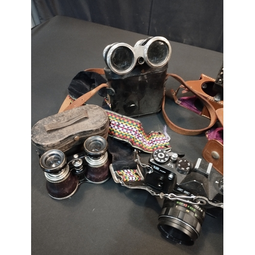 32 - Selection of Vintage Binoculars and Cameras. Inc Agfa and Zenit Cameras and Bell & Howell Filmo Spor... 