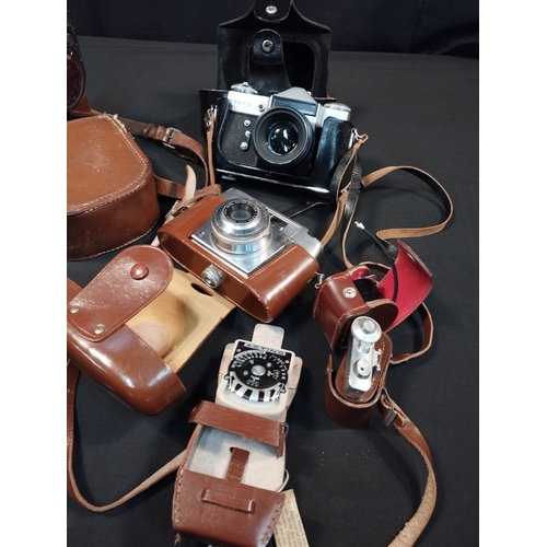 32 - Selection of Vintage Binoculars and Cameras. Inc Agfa and Zenit Cameras and Bell & Howell Filmo Spor... 