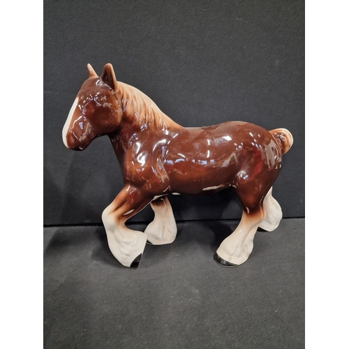 49 - Three Beswick style hand painted Shire horses