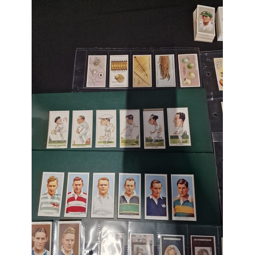 50 - A large Bundle of cigarette cards, includes sets in original packaging and frames.