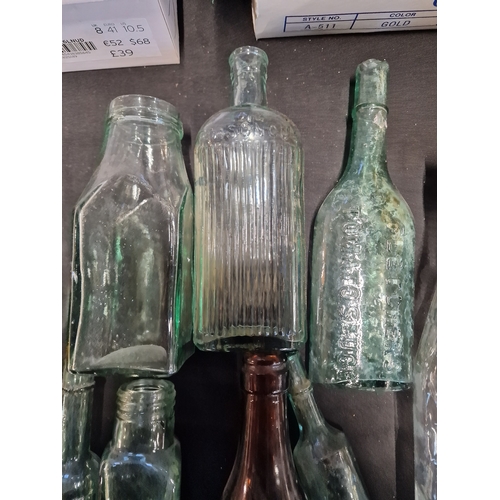 52 - Collection of vintage glass bottles. Includes Duttons of Blackburn and Fletcher Ketchup