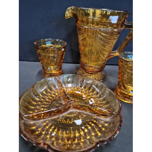 54 - Five pieces of vintage Amber glass.  Serving tray, glasses and jug