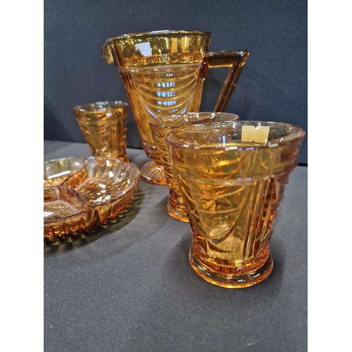 54 - Five pieces of vintage Amber glass.  Serving tray, glasses and jug