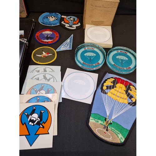 79 - A bundle of Parachutist, patches and books