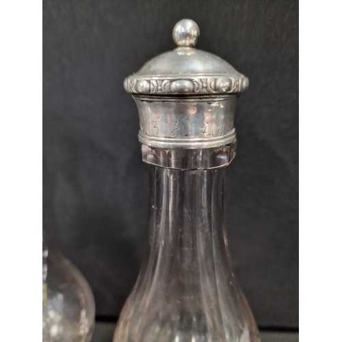 115 - Two vinatge silver 925 topped oil bottles approximately 21cm H. One A/F