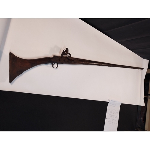 23 - Antique Short Stock Camel Black Powder Flint Lock Rifle  Decommissioned. Approx 158cm Length.