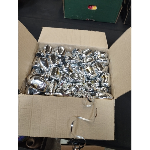 132 - Seven Boxes of 100 Silver Foil Cops Parcel Decorations