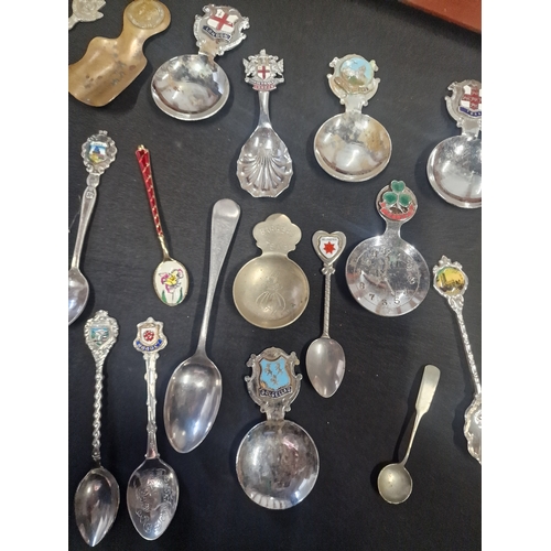 156 - A collection of tea spoons and display case