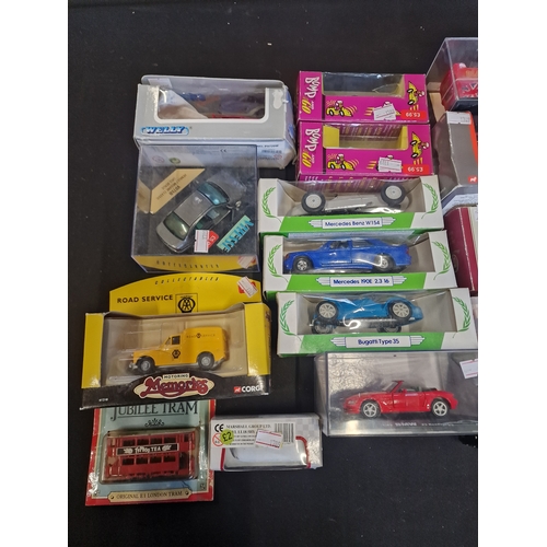 160 - A collection corgi, welly and matchbox cars, trucks and vans.