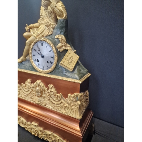 185 - A French style reproduction bronze and copper gilt Mantel clock.