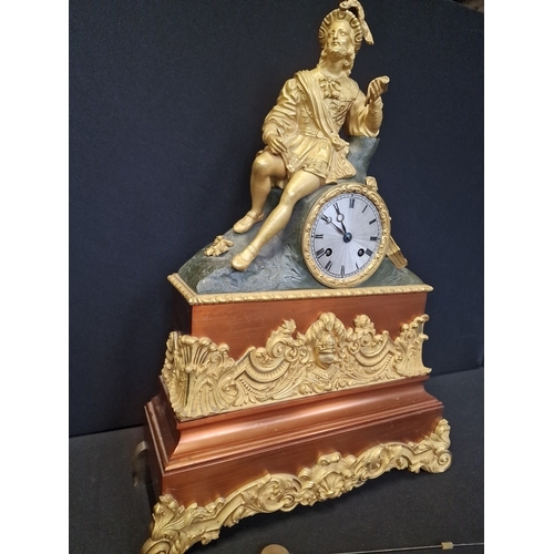 185 - A French style reproduction bronze and copper gilt Mantel clock.