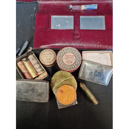 189 - A victorian ladies cosmetic set with case.  Contents include, loose powder, rouge, mirror, lip stick... 