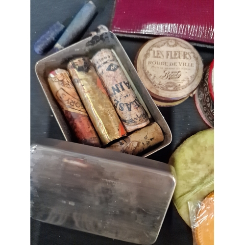 189 - A victorian ladies cosmetic set with case.  Contents include, loose powder, rouge, mirror, lip stick... 