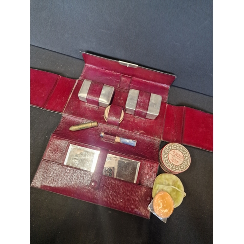 189 - A victorian ladies cosmetic set with case.  Contents include, loose powder, rouge, mirror, lip stick... 