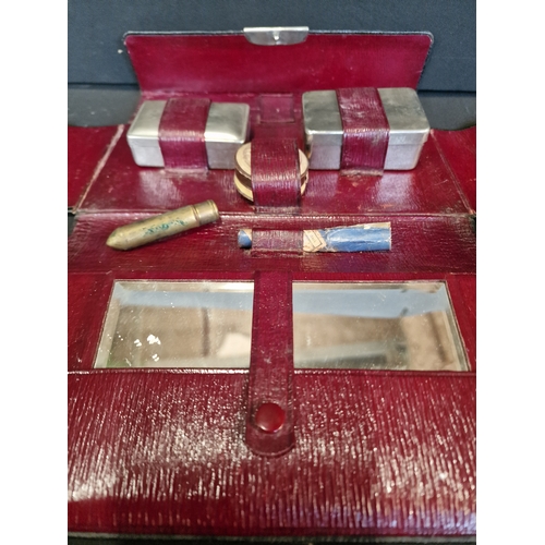 189 - A victorian ladies cosmetic set with case.  Contents include, loose powder, rouge, mirror, lip stick... 