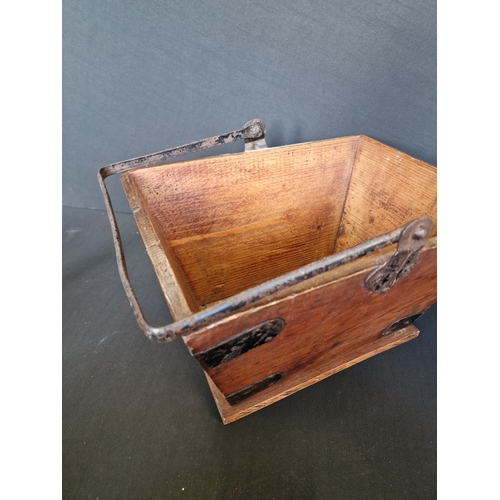 191 - A vintage housemaid box metal bound with swing handle
Measures 35h x 35L x 26.5w approximately