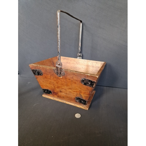 191 - A vintage housemaid box metal bound with swing handle
Measures 35h x 35L x 26.5w approximately