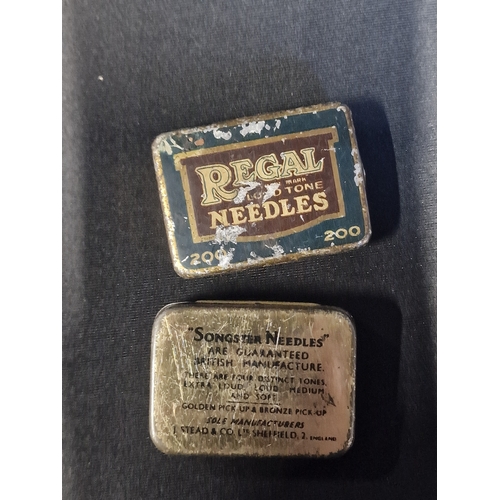 228 - Two vintage tape tins of gramophone needles by Regal and Songster.